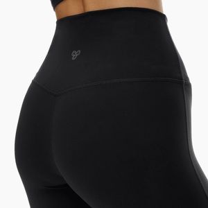 TnaLIFE™ Cheeky Hi-Rise Legging Flare NEW WITH TAGS